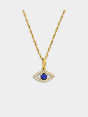 Yellow Gold Blue Cubic Zirconia Solitaire Evil Eye Pendant on a Sterling Silver and Gold chain.