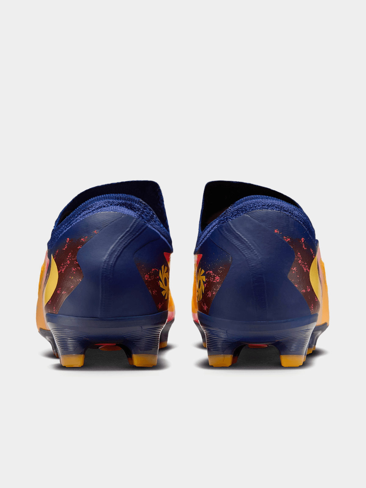 blue and orange nike football cleats
