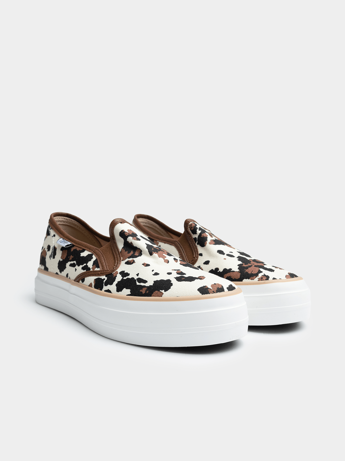 mimohiromiページ Women's Tomy Ari Cow Print Sneaker | Bash