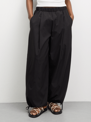 The FIX Women's Black Flat Taslon Pleated Barrel Pants With Cuff Ties